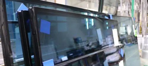 Insulating glass unit (IGU) in production as manufacturers prepare for OPSS gas-content compliance inspections.